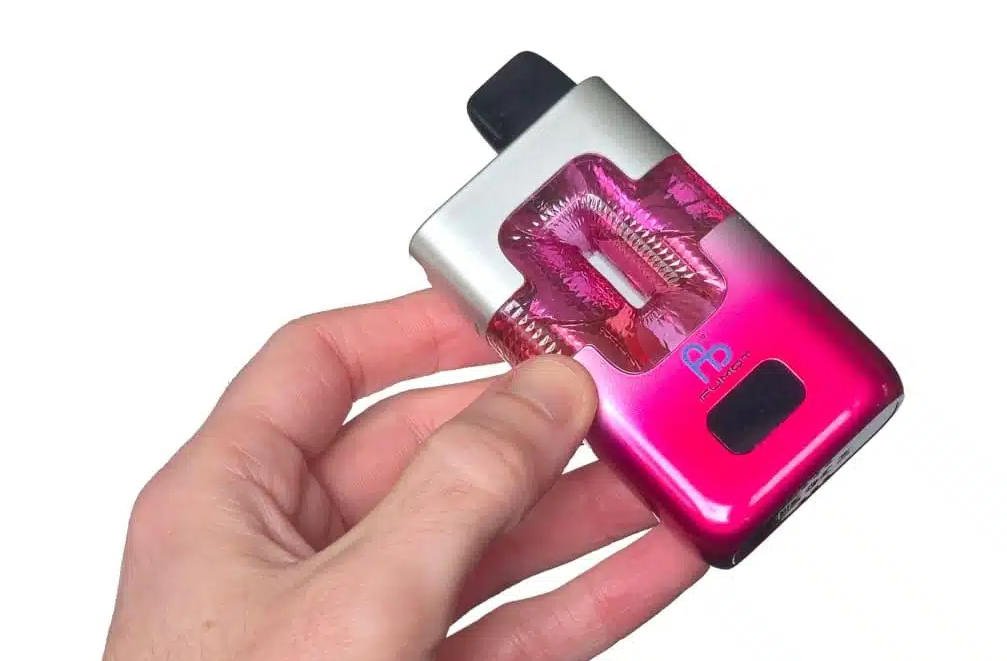 holding the fumot eco 2in1 50k banana ice & black dragon ice in hand