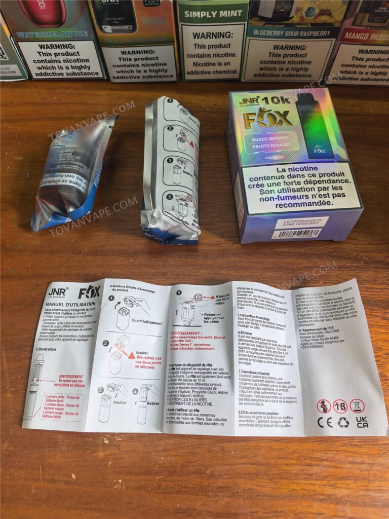 complete unboxing of the jnr fox 10k: main device, e-liquid pod, user manual, and box complete unboxing of the jnr fox 10k: main device, e-liquid pod, user manual, and box