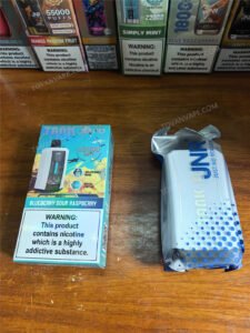 front view of the jnr tank pro 33000 box alongside its sealed inner pouch