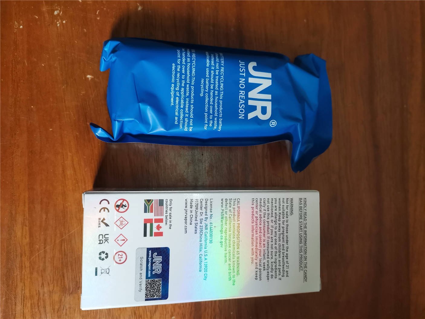 rear view of the jnr falcon x 18k packaging box and the back of the product bag