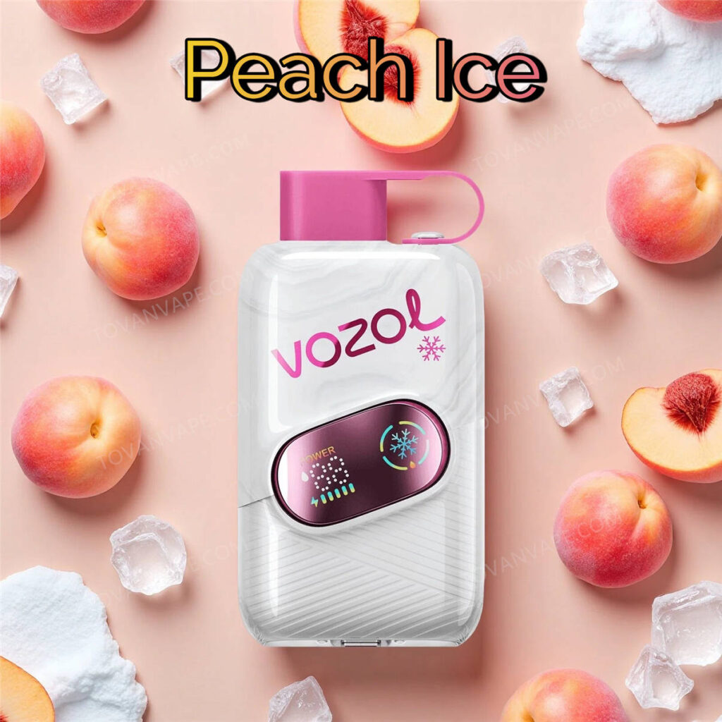 le vozol star click 50k en version peach ice, posé à côté de pêches mûres et de glaçons rafraîchissants le vozol star click 50k en version peach ice, posé à côté de pêches mûres et de glaçons rafraîchissants