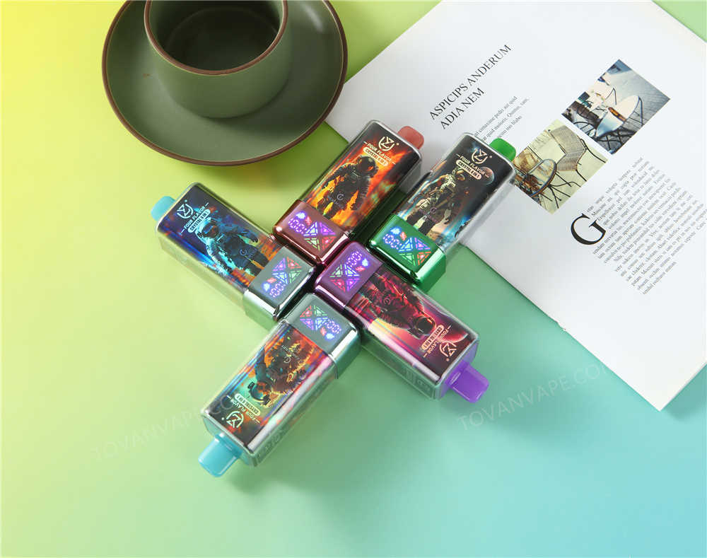 Fünf E-Zigaretten der Modelle uzy und crystal 100k in verschiedenen Geschmacksrichtungen liegen auf einem Schreibtisch Fünf E-Zigaretten der Modelle uzy und crystal 100k in verschiedenen Geschmacksrichtungen liegen auf einem Schreibtisch